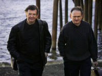 Kevin Burke, fiddle (left);Cal Scott, guitars, mandolin, bouzouki, dulcimer (right) PR photo for Across the Black River CD